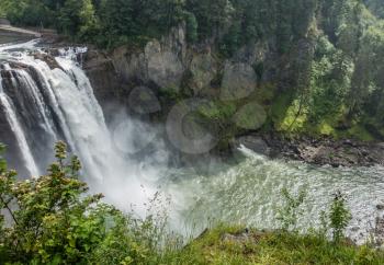 Water explodes into a waterfall in Snoqualmie, Washington.