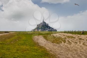 Le Mont Saint Michelewith blue sky and clouds, Normandy, northern France