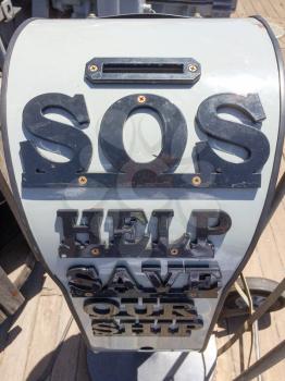SOS save our ship sign money donation collection box on USS Iowa naval warship destroyer battleship