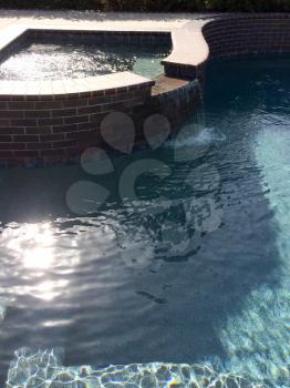 modern swimming pool design aqua blue water sine waves reflections