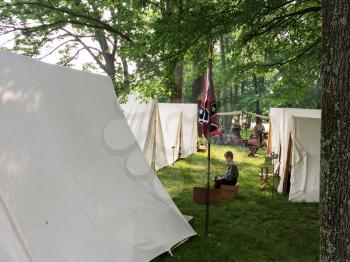american civil war reenactment scene with white tent
