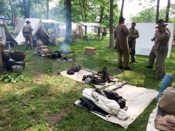 american civil war reenactment scene objects men in camp
