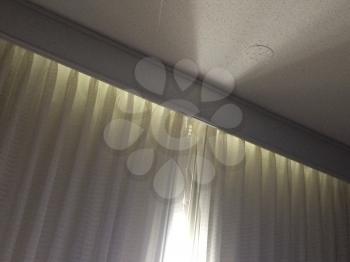Grey silver background geometric lines with light through curtains