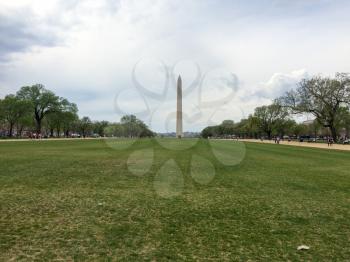 Washington monument in spring from raod view with sky