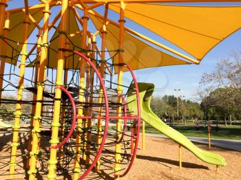New modern Playground equipment shade and ropes at park school