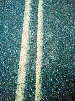 double yellow road lines on asphalt as cool background