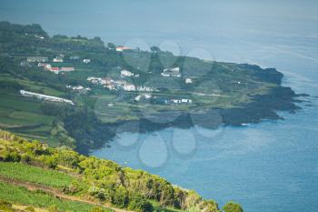 Ponta da Queimada panormaic view point showing agricultural fields lit with sub, Pico Island, Azores, Portugal