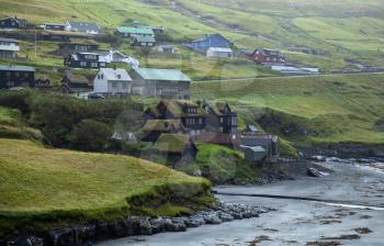 Typical faroe houses with grassy roofs in the villafe of Leynar, Faroe Islands