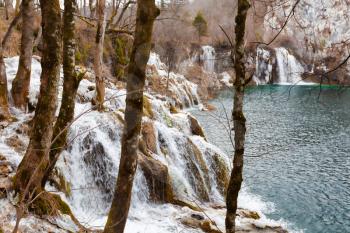 Plitvice Lakes National Park in winter, water going through forest