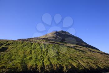 Green grass pyramid mountain of Bordoy, Faroe Islands