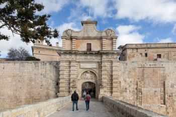 Mdina, Malta - 4 January 2020: People entering Mdina via its main gate