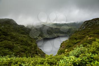 View to Lagoa Comprida on a foggy day, Flores, Azores, Portugal