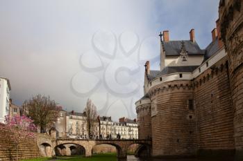 Nantes, France: 22 February 2020: Entrance gate and bridge to Castle of the Dukes of Brittany