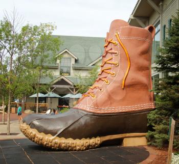 FREEPORT, MAINE, august 31 2014:  L.L.Bean.  boot at the entrance of this, leading merchant of quality outdoor gear and has been open 24 hours a day since 1951.