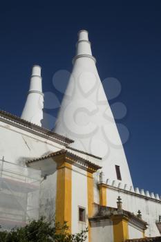 Two white chimneys of Sintra National Palace in Portugal