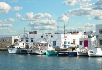 Fishing boats at the marina with tilt shift effect in Naoussa, Paros island in the cyclades, Greece