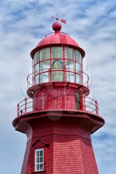Close up of the red lighthouse La Martre in Gaspesie, Quebec, Canada 
