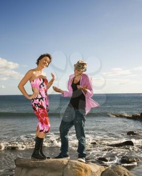 Royalty Free Photo of Two Women Standing on a Beach