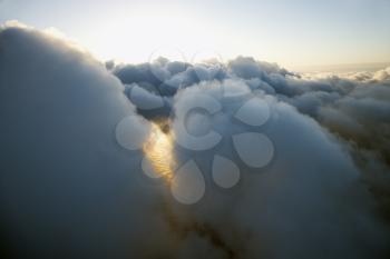 View from above the clouds with Pacific ocean underneath.