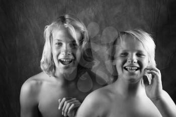 Royalty Free Photo of Preteen Brothers Laughing