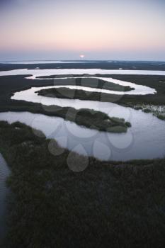 Aerial scenic view of winding waterway in marshland at Baldhead Island, North Carolina.