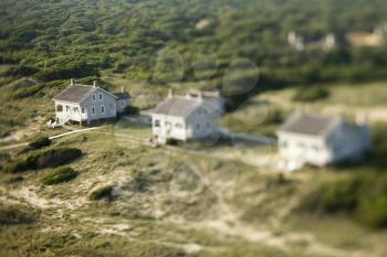 Royalty Free Photo of a Selective Focus Aerial of Beach Cottages in Bald Head Island, North Carolina