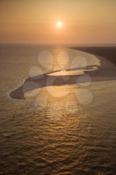Royalty Free Photo of a Sunset Over the Atlantic Ocean and Shoreline of Bald Head Island, North Carolina