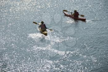 Royalty Free Photo of an Aerial Shot of Two Teenage Boys Kayaking on Bald Head Island, North Carolina