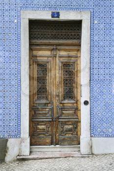 Royalty Free Photo of Exterior Doors and Tiled Building in Lisbon, Portugal