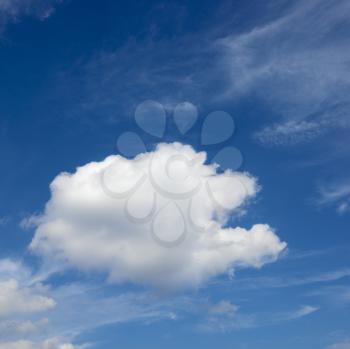 Royalty Free Photo of Puffy Cumulus Cloud in the Sky