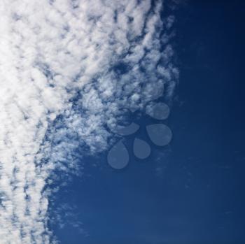 Royalty Free Photo of Cloud Formations Against a Blue Sky