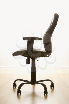 Royalty Free Photo of an empty office desk chair