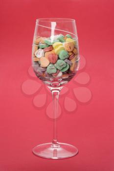 Royalty Free Photo of a Wine Glass Full of Candy Hearts