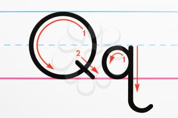 Royalty Free Photo of a Close-up of the Letter Q Handwriting Practice Page