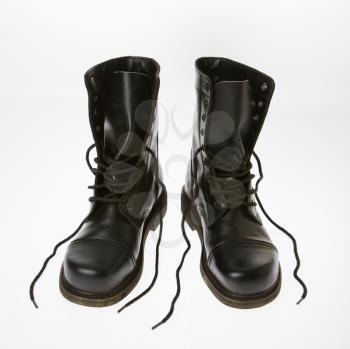 Royalty Free Photo of Black Leather Boots With Laces Untied