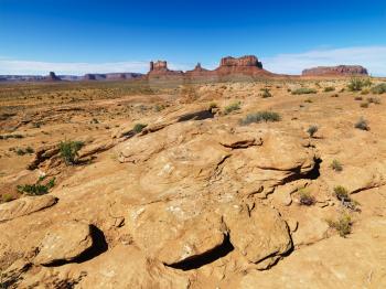 Royalty Free Photo of a Rocky Desert Landscape With Landforms and Mountains