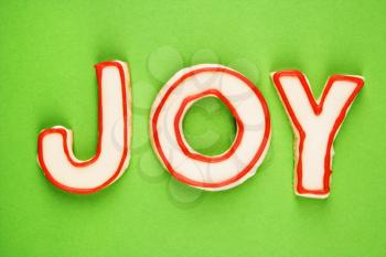 Royalty Free Photo of Sugar Cookies with Decorative Icing That Spell Joy