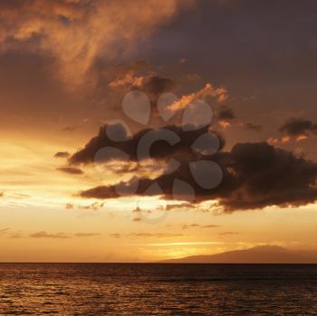 Royalty Free Photo of a Beautiful Sunset Over the Pacific Ocean Near Maui Hawaii