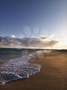 The beach at dusk in Maui, Hawaii.