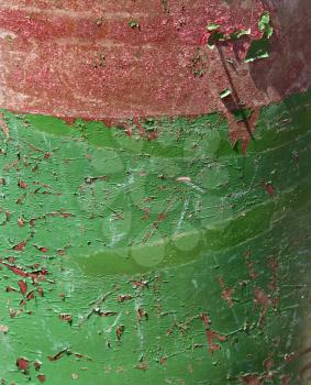 Royalty Free Photo of a Closeup of green and red rusted container