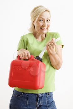 Royalty Free Photo of a Woman Holding a Gas Can