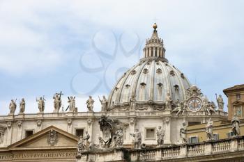 Statuary and dome of St Peter's Basilica. Horizontal shot.