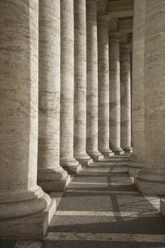 Columned hallway in Saint Peter's Square. Vertical shot.