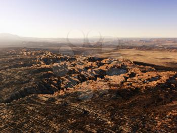 Rock formations caused by wind and water. Mesas line the background landsacpe. Horizontal shot.