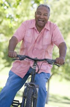 Royalty Free Photo of a Senior Man on a Bicycle