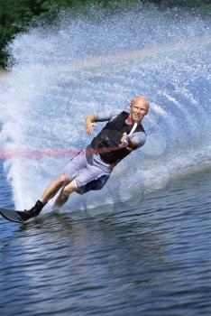 Royalty Free Photo of a Man Water Skiing