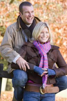 Royalty Free Photo of a Man and Woman at a Fence