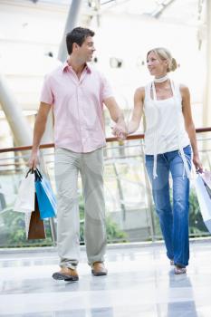 Royalty Free Photo of a Young Couple at a Mall