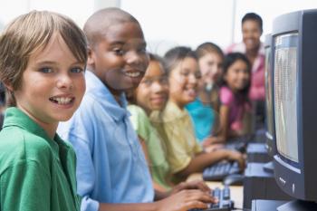 Royalty Free Photo of Students in Computer Class