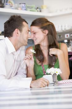 Royalty Free Photo of a Couple Looking at Each Other